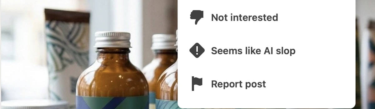 LinkedIn post menu showing the new "Seems like AI slop" flag option alongside Not Interested and Report Post